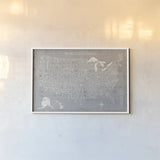 Hand Lettered USA Map Gray by Michael Mullan. shown as a paper print in a white frame. Available as a archival giclee rolled canvas, fine art paper, or poster print. SKU 43245i.