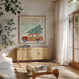Holiday on Wheels II by Michael Mullan. Shown in a natural wood frame in a cozy modern living room. Available as an archival giclee rolled canvas, fine art paper, or poster print. SKU 21793a.