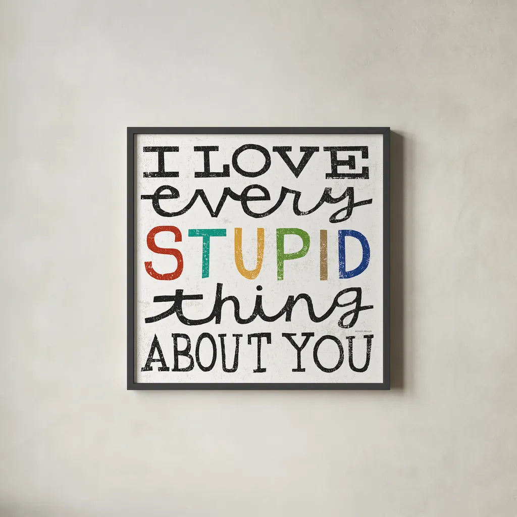 I Love Every Stupid Thing About You by Michael Mullan. Shown in a sleek black glass frame for a contemporary gallery look. Available as an archival giclee rolled canvas, fine art paper, or poster print. SKU 14546a.