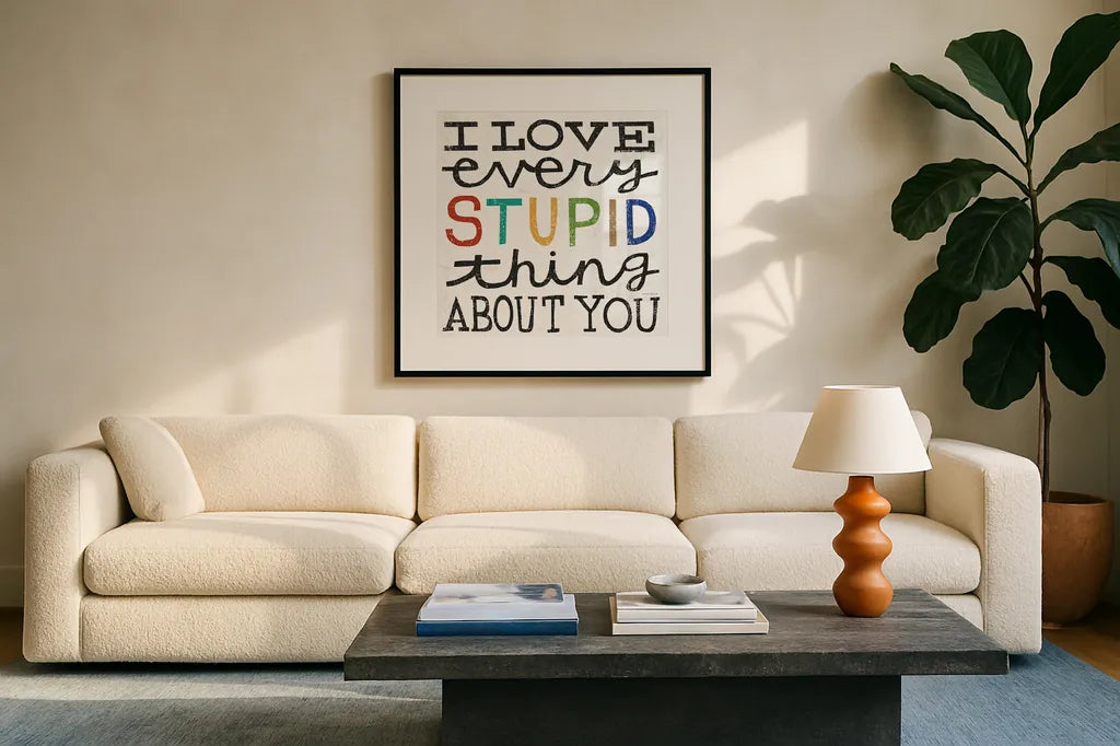 I Love Every Stupid Thing About You by Michael Mullan. Displayed in a glass frame with matte in a clean modern living room. Available as an archival giclee rolled canvas, fine art paper, or poster print. SKU 14546a.