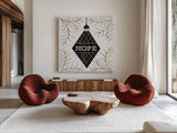 Jolly Holiday Ornaments Hope Metallic by Michael Mullan. Shown as extra-large giant wall art in a modern living room. Available as an archival giclee rolled canvas, fine art paper, or poster print. SKU 66811a.