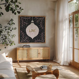 Jolly Holiday Ornaments Love Metallic by Michael Mullan. Shown in a natural wood frame in a cozy modern living room. Available as an archival giclee rolled canvas, fine art paper, or poster print. SKU 50316a.