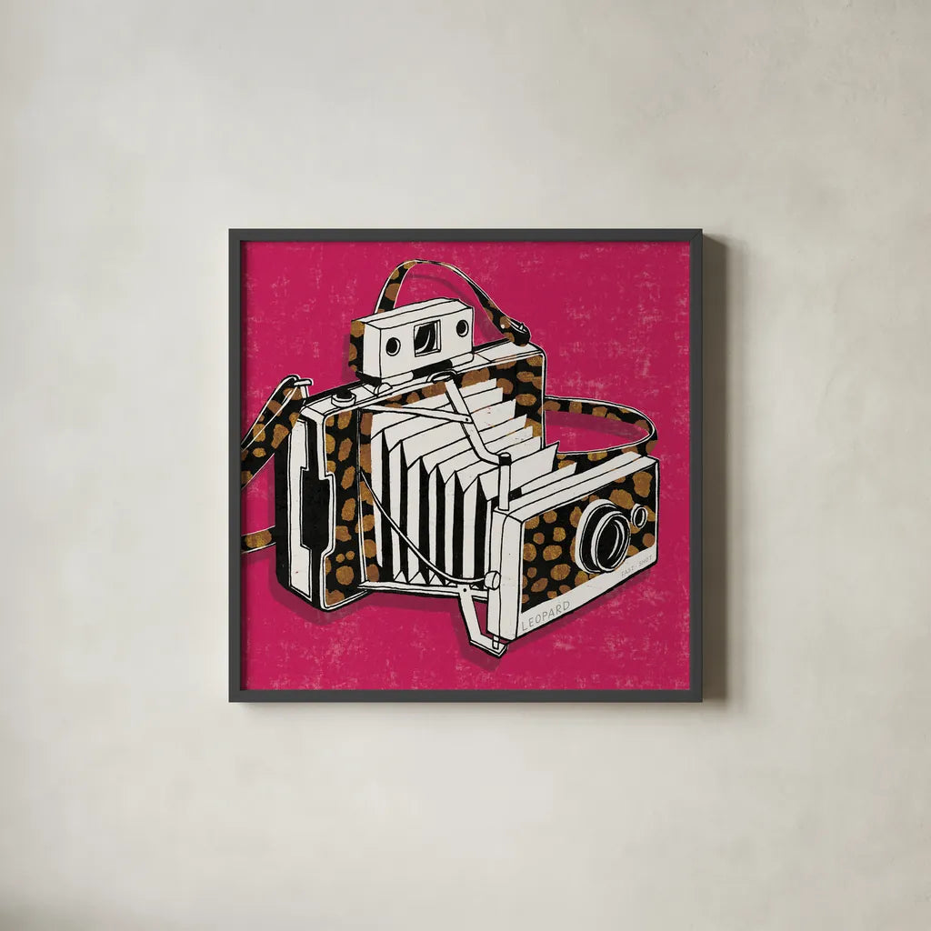 Jungle Camera Bright Rose by Michael Mullan. Shown in a sleek black glass frame for a contemporary gallery look. Available as an archival giclee rolled canvas, fine art paper, or poster print. SKU 58418a.