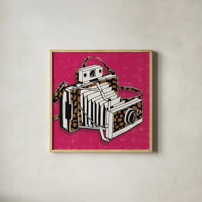 Jungle Camera Bright Rose by Michael Mullan. Shown in a natural wood glass frame for a timeless modern aesthetic. Available as an archival giclee rolled canvas, fine art paper, or poster print. SKU 58418a.