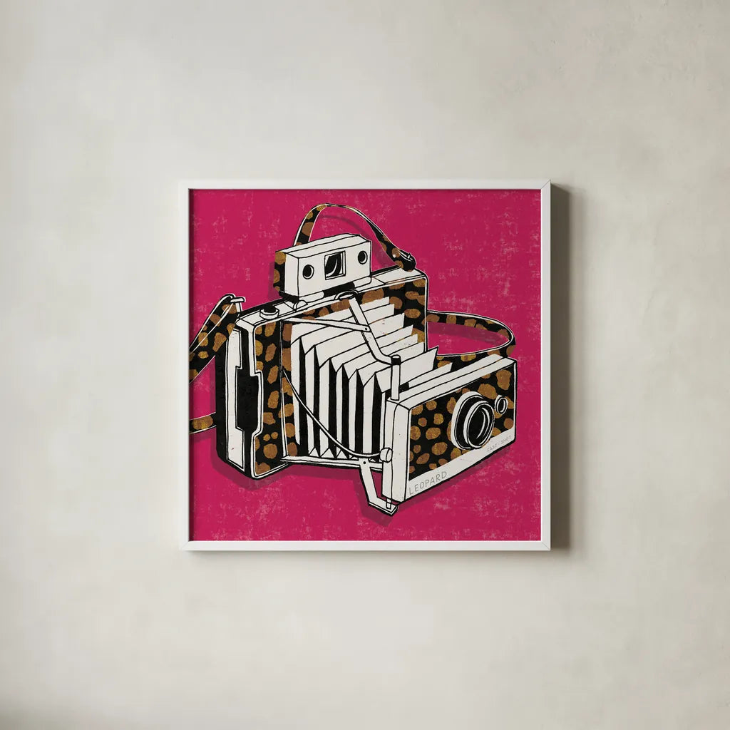 Jungle Camera Bright Rose by Michael Mullan. Shown in a crisp white glass frame for a clean and minimalist style. Available as an archival giclee rolled canvas, fine art paper, or poster print. SKU 58418a.