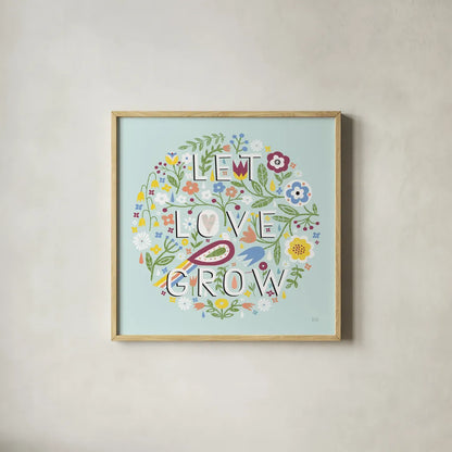 Let Love Grow v2 by Michael Mullan. Shown in a natural wood glass frame for a timeless modern aesthetic. Available as an archival giclee rolled canvas, fine art paper, or poster print. SKU 42919a.