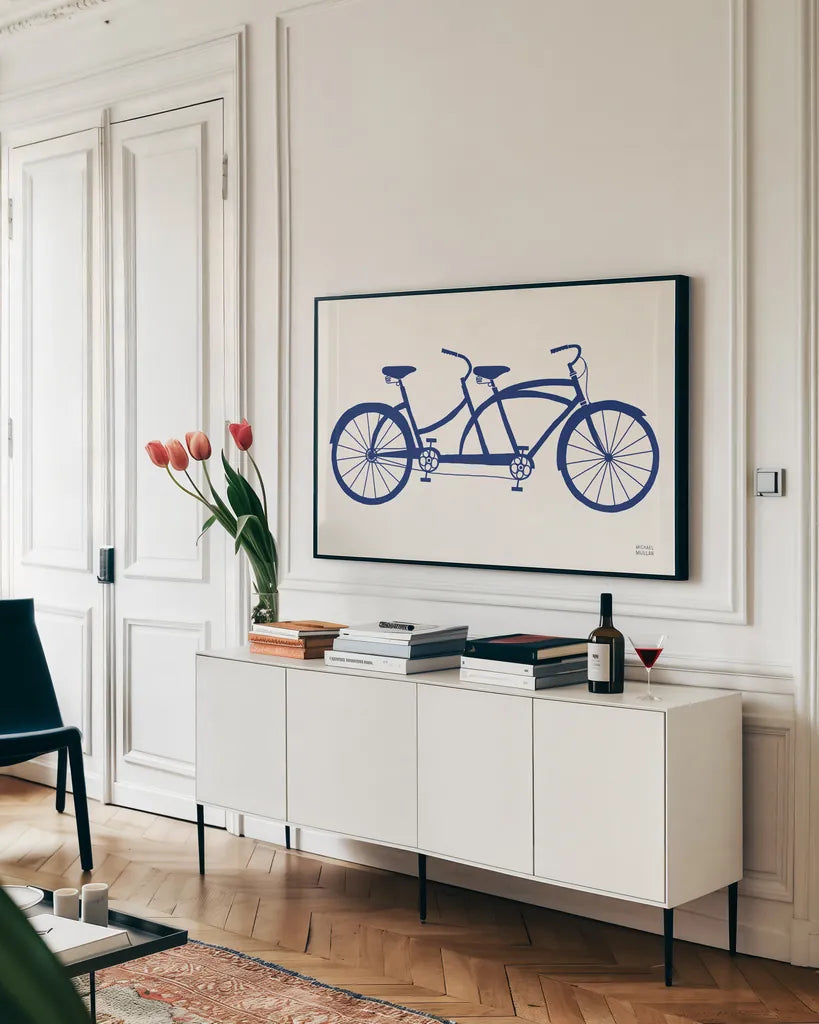Lets Cruise Bicycle by Michael Mullan. shown as a framed stretched canvas in a living room above a console. Available as a archival giclee rolled canvas, fine art paper, or poster print. SKU 87838i.