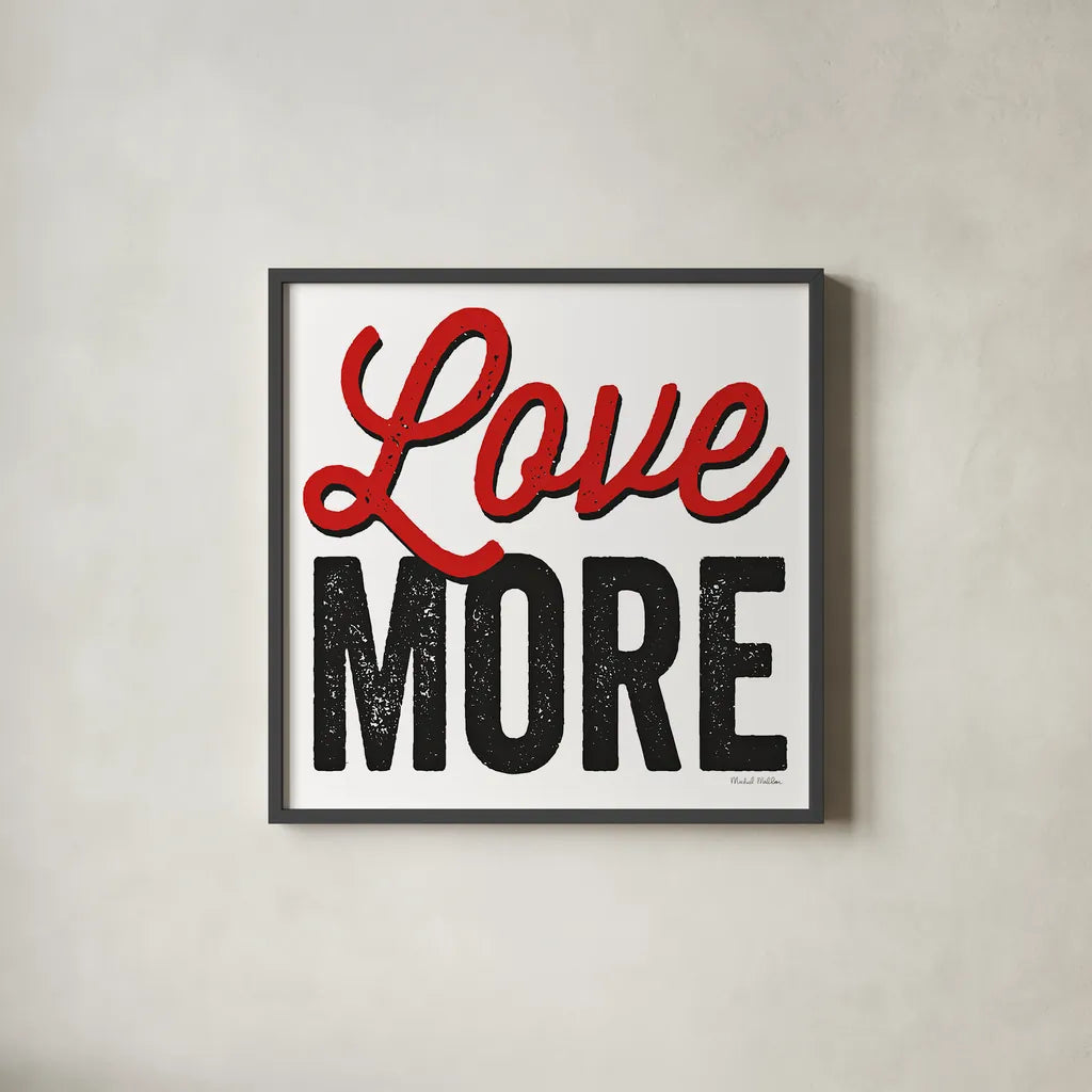 Love More on White by Michael Mullan. Shown in a sleek black glass frame for a contemporary gallery look. Available as an archival giclee rolled canvas, fine art paper, or poster print. SKU 30984a.