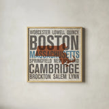 Massachusetts by Michael Mullan. Shown in a natural wood glass frame for a timeless modern aesthetic. Available as an archival giclee rolled canvas, fine art paper, or poster print. SKU 18065a.