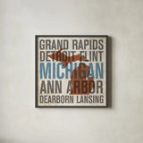 Michigan by Michael Mullan. Shown in a sleek black glass frame for a contemporary gallery look. Available as an archival giclee rolled canvas, fine art paper, or poster print. SKU 18066a.