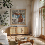 Michigan by Michael Mullan. Shown in a natural wood frame in a cozy modern living room. Available as an archival giclee rolled canvas, fine art paper, or poster print. SKU 18066a.