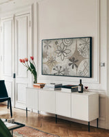 Mid Century Mystique Archroma by Michael Mullan. shown as a framed stretched canvas in a living room above a console. Available as a archival giclee rolled canvas, fine art paper, or poster print. SKU 30003i.