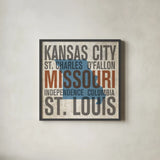 Missouri by Michael Mullan. Shown in a sleek black glass frame for a contemporary gallery look. Available as an archival giclee rolled canvas, fine art paper, or poster print. SKU 18068a.