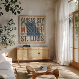 Missouri by Michael Mullan. Shown in a natural wood frame in a cozy modern living room. Available as an archival giclee rolled canvas, fine art paper, or poster print. SKU 18068a.