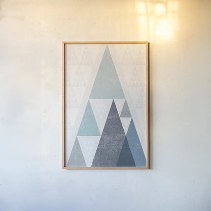 Mod Triangles III Blue by Michael Mullan. shown as a paper print in a natural frame. Available as a archival giclee rolled canvas, fine art paper, or poster print. SKU 22295h.