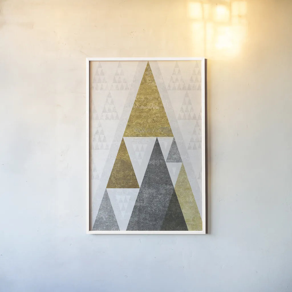 Mod Triangles III Gold by Michael Mullan. shown as a paper print in a white frame. Available as a archival giclee rolled canvas, fine art paper, or poster print. SKU 22303h.