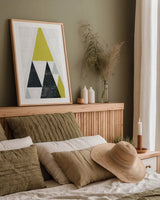 Mod Triangles III Yellow Black by Michael Mullan. shown as a paper print in a natural frame. Available as a archival giclee rolled canvas, fine art paper, or poster print. SKU 64128h.