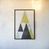Mod Triangles III Yellow Black by Michael Mullan. shown as a paper print in a black flame. Available as a archival giclee rolled canvas, fine art paper, or poster print. SKU 64128h.