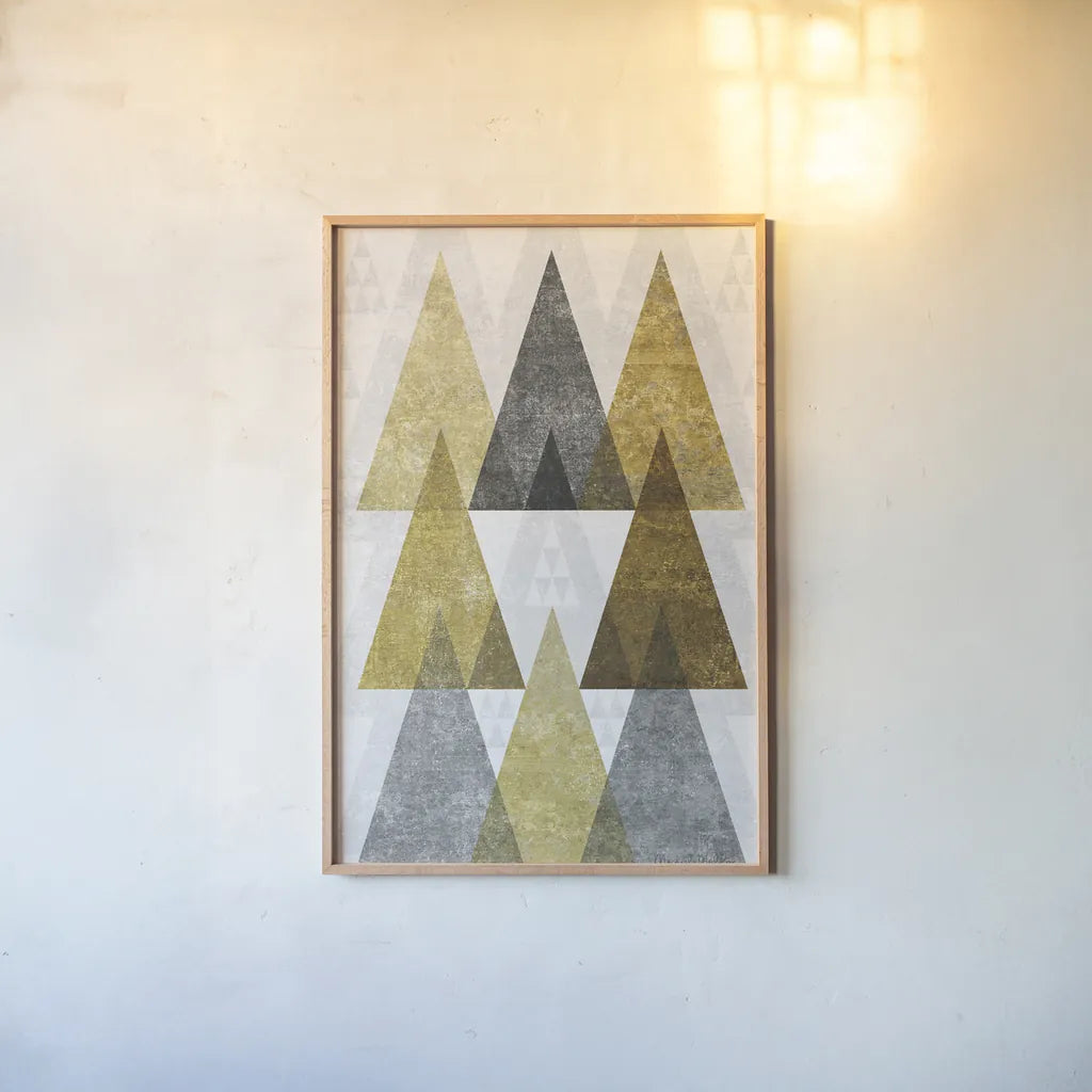 Mod Triangles IV Gold by Michael Mullan. shown as a paper print in a natural frame. Available as a archival giclee rolled canvas, fine art paper, or poster print. SKU 22304h.