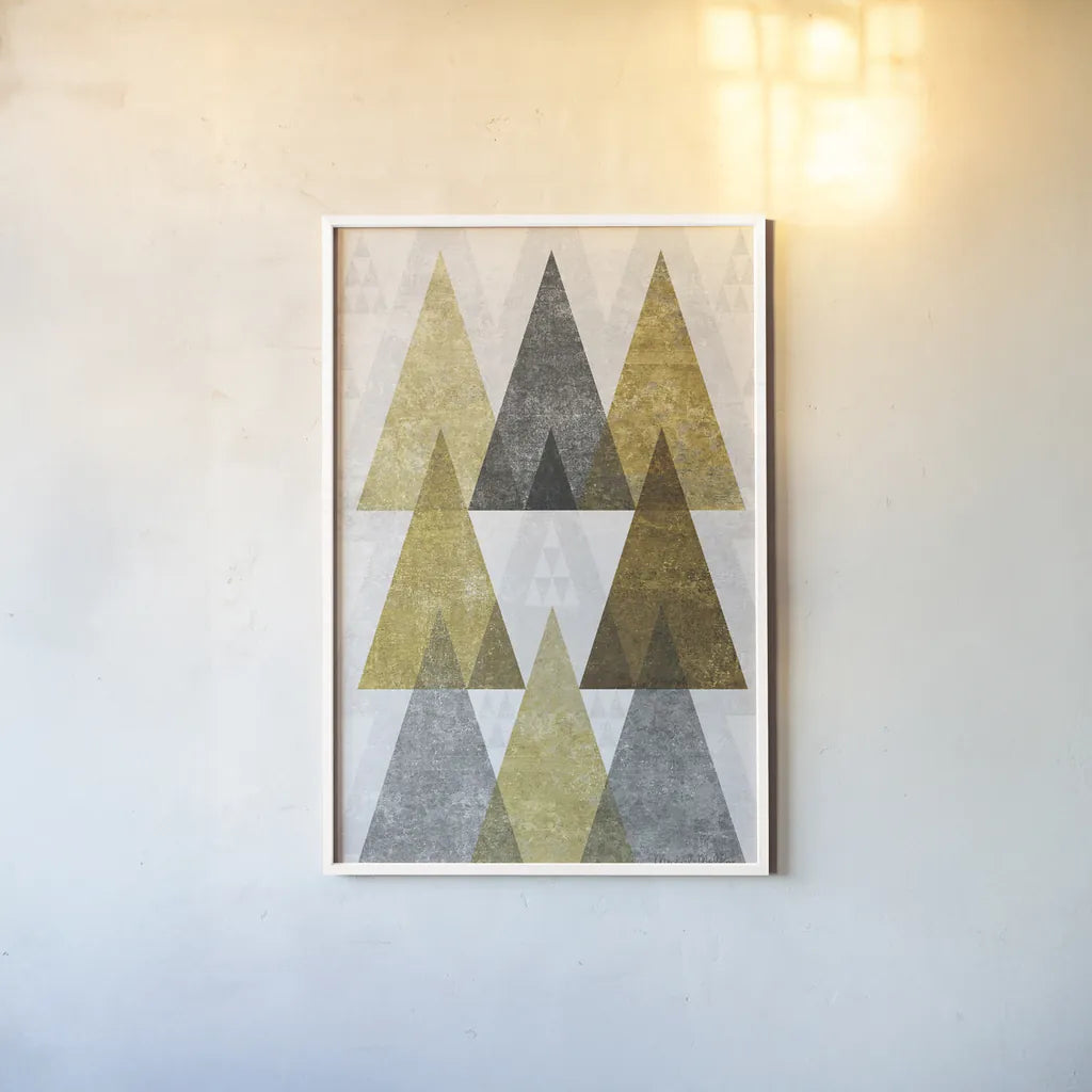 Mod Triangles IV Gold by Michael Mullan. shown as a paper print in a white frame. Available as a archival giclee rolled canvas, fine art paper, or poster print. SKU 22304h.