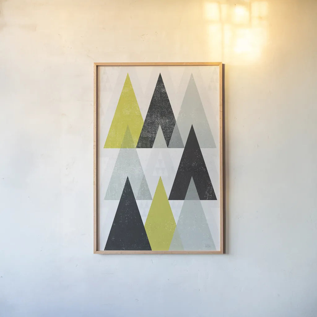 Mod Triangles IV Yellow Black by Michael Mullan. shown as a paper print in a natural frame. Available as a archival giclee rolled canvas, fine art paper, or poster print. SKU 64129h.