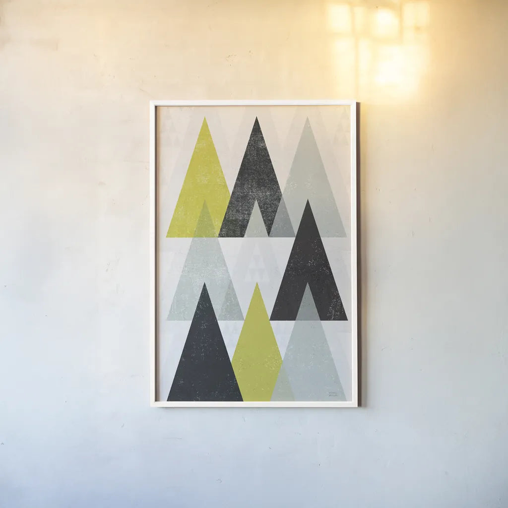 Mod Triangles IV Yellow Black by Michael Mullan. shown as a paper print in a white frame. Available as a archival giclee rolled canvas, fine art paper, or poster print. SKU 64129h.