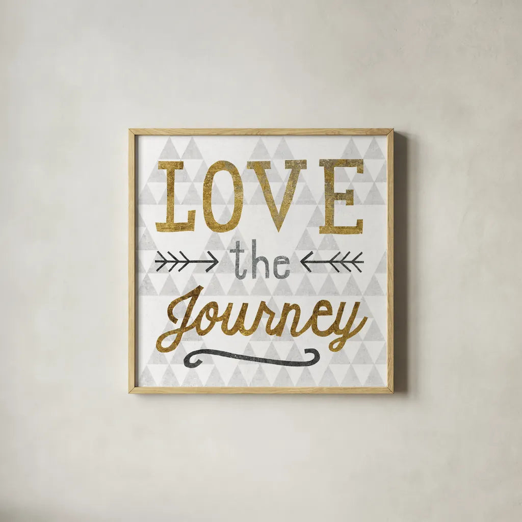 Mod Triangles Love the Journey Gold by Michael Mullan. Shown in a natural wood glass frame for a timeless modern aesthetic. Available as an archival giclee rolled canvas, fine art paper, or poster print. SKU 22300a.