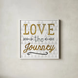 Mod Triangles Love the Journey Gold by Michael Mullan. Shown in a crisp white glass frame for a clean and minimalist style. Available as an archival giclee rolled canvas, fine art paper, or poster print. SKU 22300a.