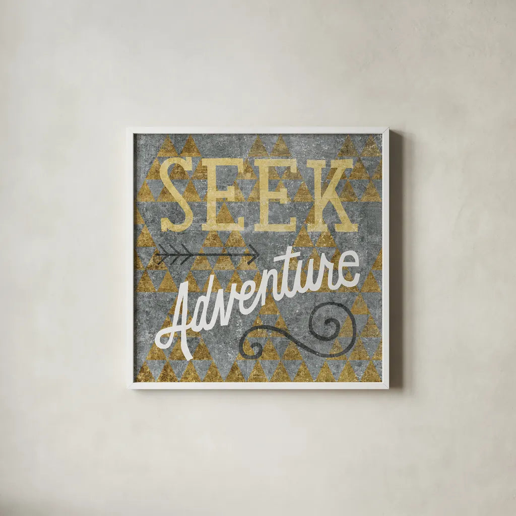 Mod Triangles Seek Adventure Gold by Michael Mullan. Shown in a crisp white glass frame for a clean and minimalist style. Available as an archival giclee rolled canvas, fine art paper, or poster print. SKU 22297a.