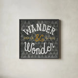 Mod Triangles Wander and Wonder Gold by Michael Mullan. Shown in a sleek black glass frame for a contemporary gallery look. Available as an archival giclee rolled canvas, fine art paper, or poster print. SKU 22299a.
