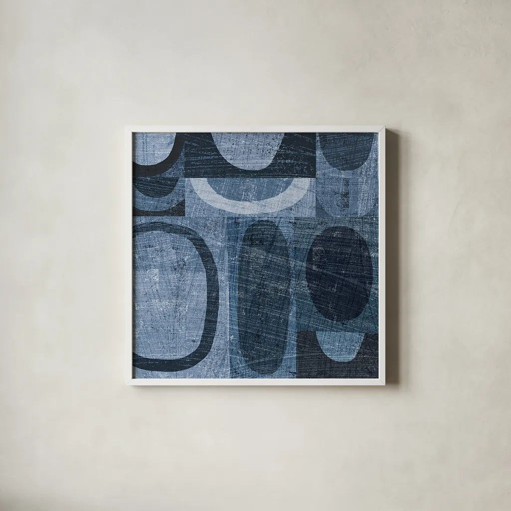 Modern Geometric Indigo and Navy I by Michael Mullan. Shown in a crisp white glass frame for a clean and minimalist style. Available as an archival giclee rolled canvas, fine art paper, or poster print. SKU 18353a.