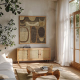 Modern Geometric Neutral I by Michael Mullan. Shown in a natural wood frame in a cozy modern living room. Available as an archival giclee rolled canvas, fine art paper, or poster print. SKU 12507a.