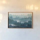 Mountainscape Blue by Michael Mullan. shown as a paper print in a natural frame. Available as a archival giclee rolled canvas, fine art paper, or poster print. SKU 22466i.