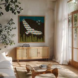 Nighttime Dwellers Eagle by Michael Mullan. Shown in a natural wood frame in a cozy modern living room. Available as an archival giclee rolled canvas, fine art paper, or poster print. SKU 50521a.