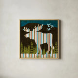 Nighttime Dwellers Moose by Michael Mullan. Shown in a natural wood glass frame for a timeless modern aesthetic. Available as an archival giclee rolled canvas, fine art paper, or poster print. SKU 50522a.