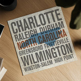 North Carolina by Michael Mullan. Shown as a detailed flat fine art print, highlighting archival giclee quality. Available as an archival giclee rolled canvas, fine art paper, or poster print. SKU 18071a.