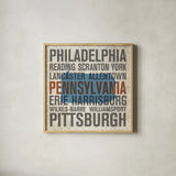 Pennsylvania by Michael Mullan. Shown in a natural wood glass frame for a timeless modern aesthetic. Available as an archival giclee rolled canvas, fine art paper, or poster print. SKU 18073a.