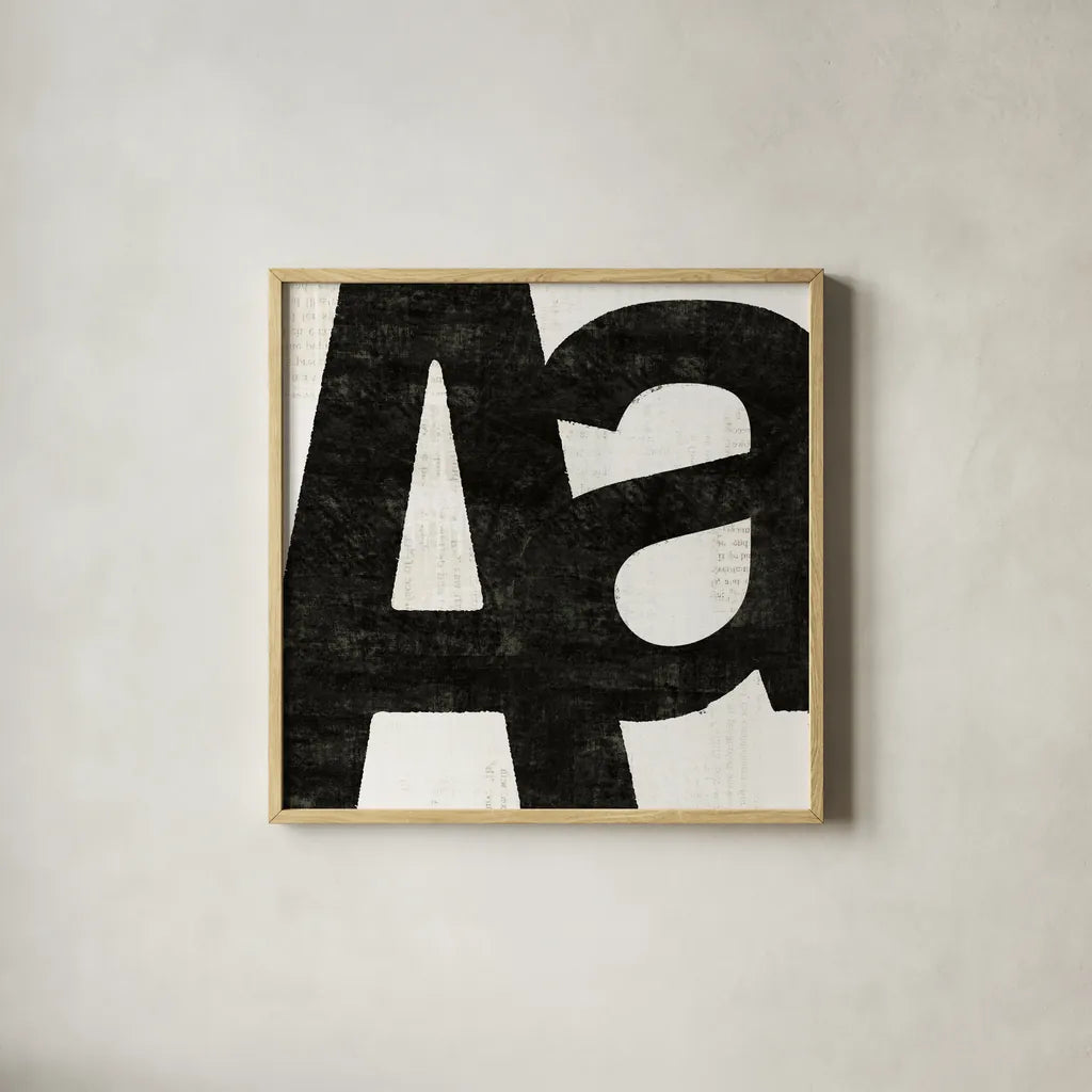 Punctuated Black Square I by Michael Mullan. Shown in a natural wood glass frame for a timeless modern aesthetic. Available as an archival giclee rolled canvas, fine art paper, or poster print. SKU 50692a.