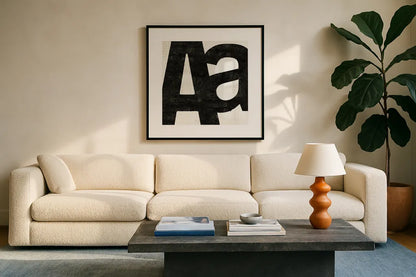 Punctuated Black Square I by Michael Mullan. Displayed in a glass frame with matte in a clean modern living room. Available as an archival giclee rolled canvas, fine art paper, or poster print. SKU 50692a.