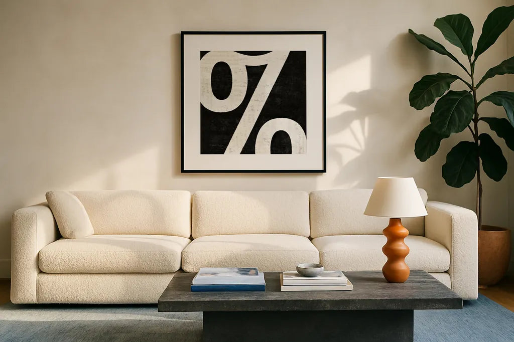 Punctuated Black Square IV by Michael Mullan. Displayed in a glass frame with matte in a clean modern living room. Available as an archival giclee rolled canvas, fine art paper, or poster print. SKU 9040a.