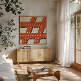 Punctuated Square IV Retro by Michael Mullan. Shown in a natural wood frame in a cozy modern living room. Available as an archival giclee rolled canvas, fine art paper, or poster print. SKU 9035a.