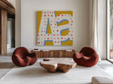 Punctuated Square IX Bright by Michael Mullan. Shown as extra-large giant wall art in a modern living room. Available as an archival giclee rolled canvas, fine art paper, or poster print. SKU 56576a.