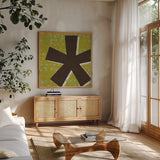 Punctuated Square VII Retro by Michael Mullan. Shown in a natural wood frame in a cozy modern living room. Available as an archival giclee rolled canvas, fine art paper, or poster print. SKU 50662a.