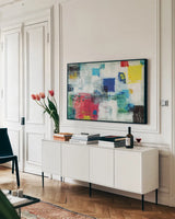 Radiance by Michael Mullan. shown as a framed stretched canvas in a living room above a console. Available as a archival giclee rolled canvas, fine art paper, or poster print. SKU 25827i.