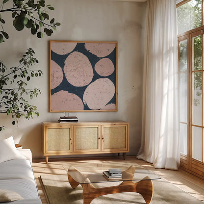 Raw Sienna IX Pink by Michael Mullan. Shown in a natural wood frame in a cozy modern living room. Available as an archival giclee rolled canvas, fine art paper, or poster print. SKU 53729a.