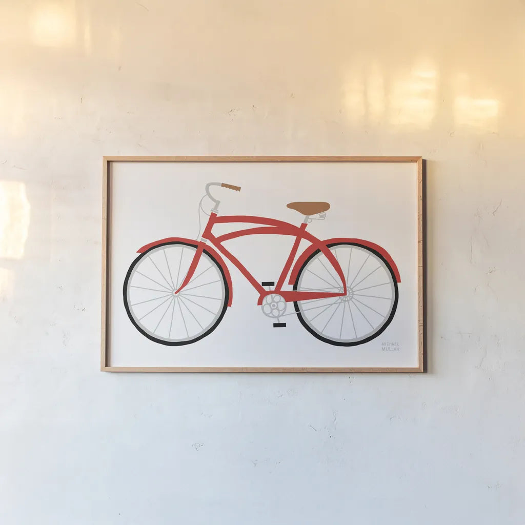 Red Beach Cruiser by Michael Mullan. shown as a paper print in a natural frame. Available as a archival giclee rolled canvas, fine art paper, or poster print. SKU 87840i.