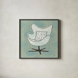 Retro Chair II by Michael Mullan. Shown in a sleek black glass frame for a contemporary gallery look. Available as an archival giclee rolled canvas, fine art paper, or poster print. SKU 50769a.