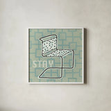 Retro Chair III Stay by Michael Mullan. Shown in a crisp white glass frame for a clean and minimalist style. Available as an archival giclee rolled canvas, fine art paper, or poster print. SKU 27881a.