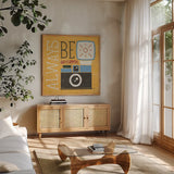 Retro Desktop Camera v2 by Michael Mullan. Shown in a natural wood frame in a cozy modern living room. Available as an archival giclee rolled canvas, fine art paper, or poster print. SKU 60985a.