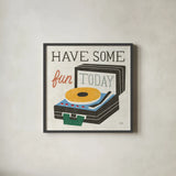 Retro Desktop Record Player v2 by Michael Mullan. Shown in a sleek black glass frame for a contemporary gallery look. Available as an archival giclee rolled canvas, fine art paper, or poster print. SKU 60986a.